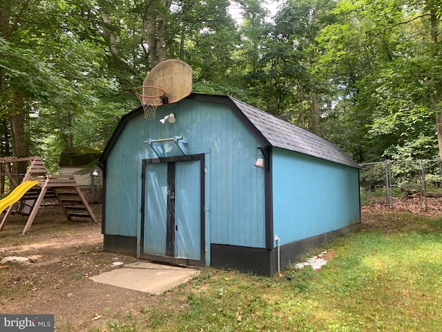 view of outdoor structure featuring a playground