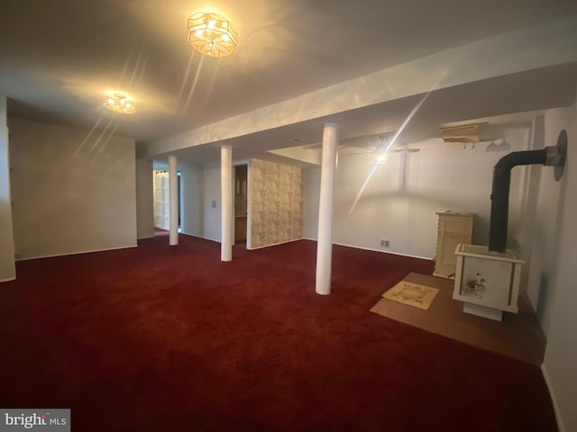 basement with dark colored carpet