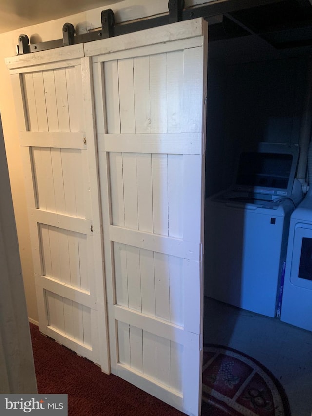 closet featuring independent washer and dryer