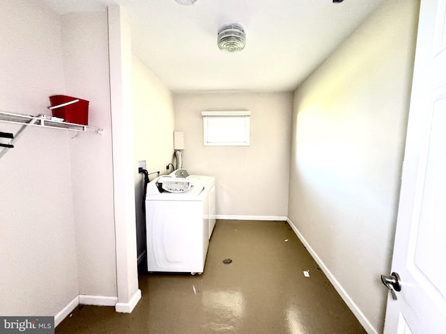 laundry room featuring washing machine and clothes dryer