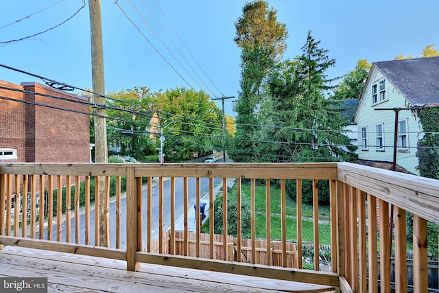 deck featuring a lawn