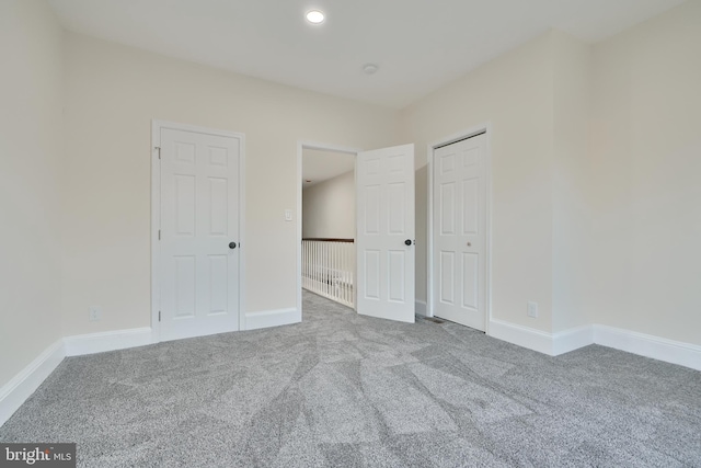 unfurnished bedroom with carpet