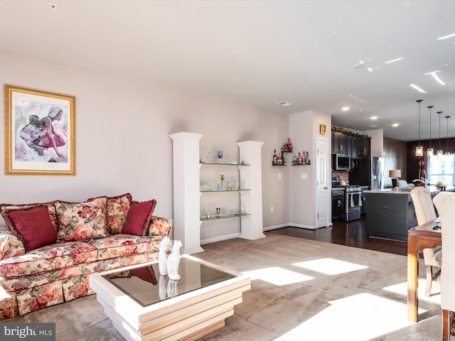 living room featuring dark hardwood / wood-style floors