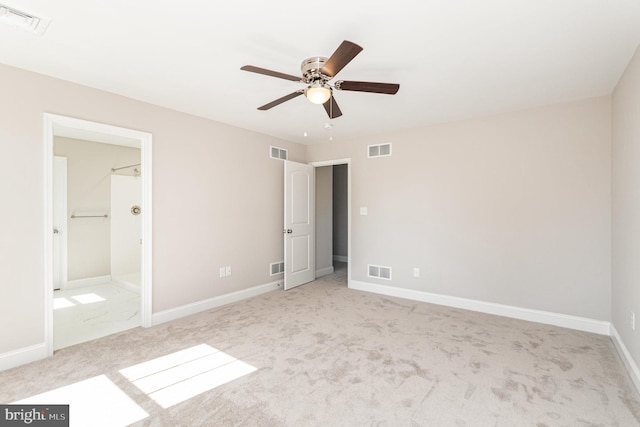 unfurnished bedroom featuring light colored carpet and ceiling fan