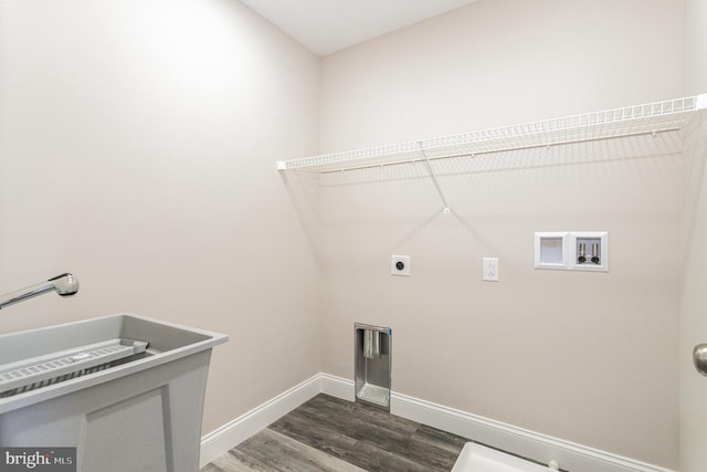 washroom with washer hookup, hookup for an electric dryer, and dark wood-type flooring