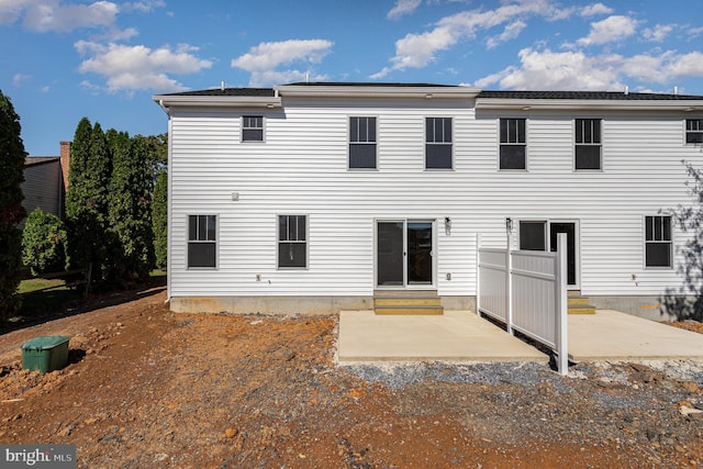 back of house with a patio area