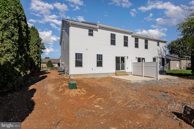 back of house featuring a patio and central air condition unit