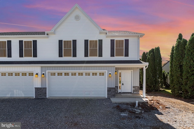 front facade with a garage