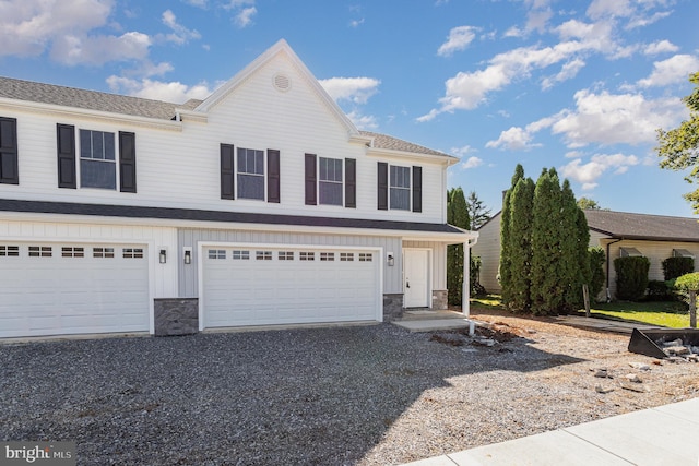 front of property featuring a garage