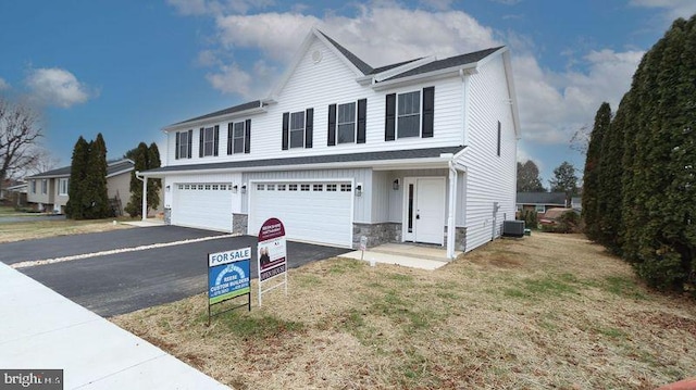 front facade with a garage