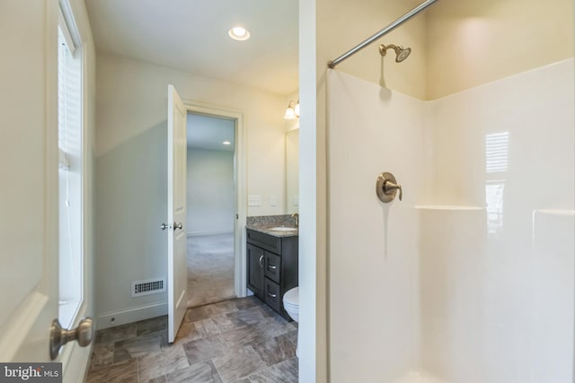 full bathroom with vanity, bathtub / shower combination, and toilet