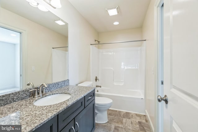 full bathroom with shower / bath combination, vanity, and toilet