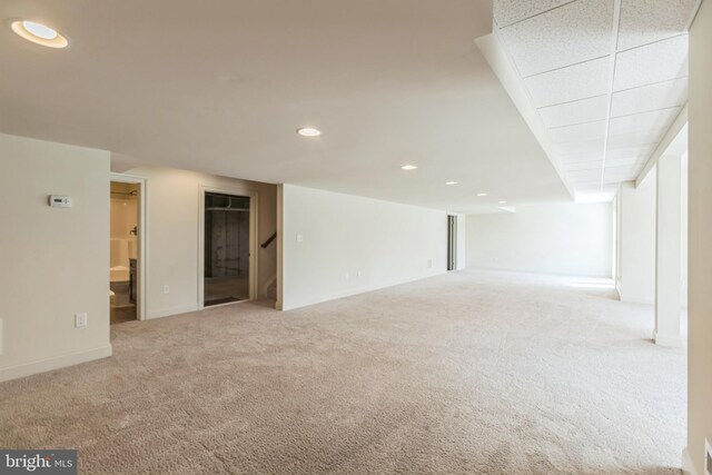 spare room featuring carpet flooring