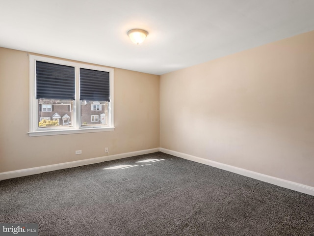 unfurnished room featuring carpet floors