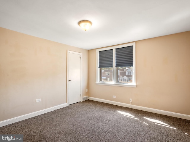 view of carpeted spare room