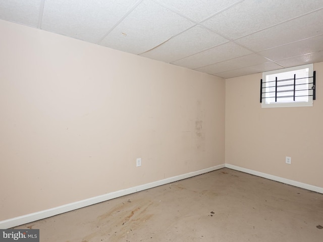 basement with a drop ceiling