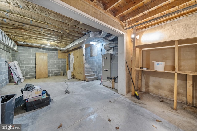 basement featuring heating unit