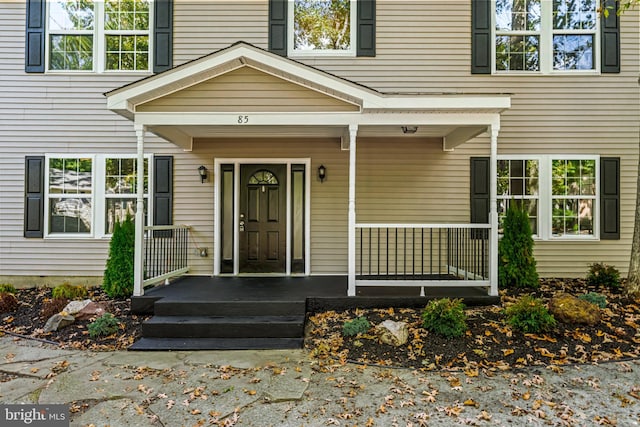 entrance to property with a porch