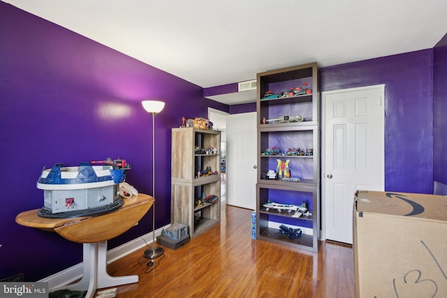 home office featuring hardwood / wood-style floors