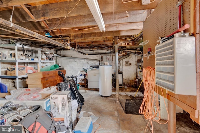 basement with washer / dryer and water heater