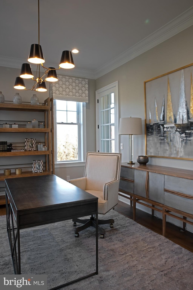 dining room featuring a chandelier, dark hardwood / wood-style flooring, and ornamental molding