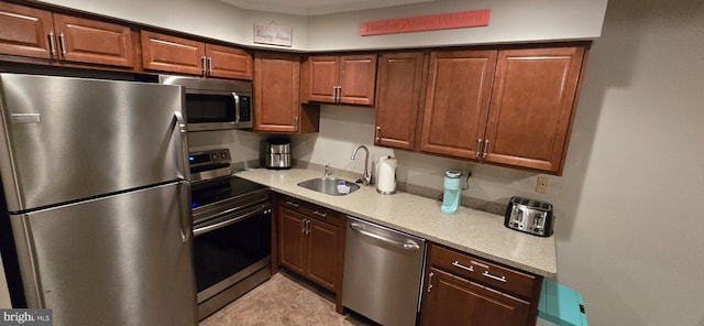 kitchen featuring appliances with stainless steel finishes and sink