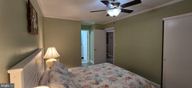 bedroom with ornamental molding, a closet, and ceiling fan