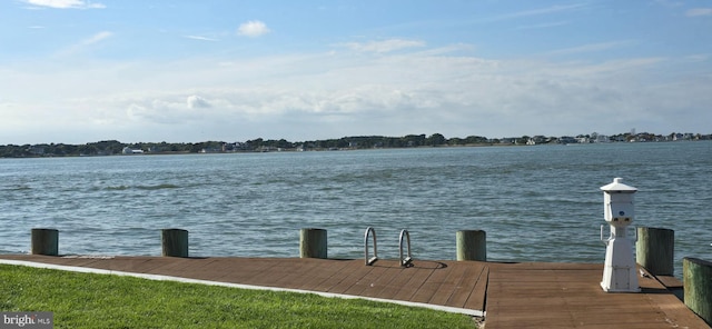 dock area featuring a water view