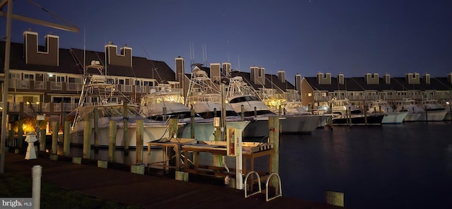 property view of water with a dock