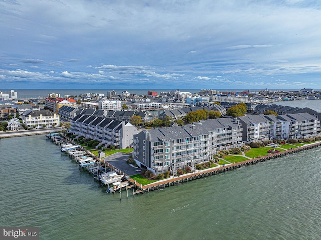 drone / aerial view with a water view