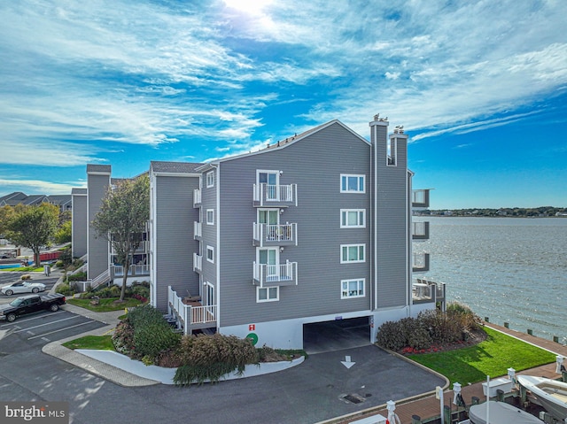 view of building exterior featuring a water view