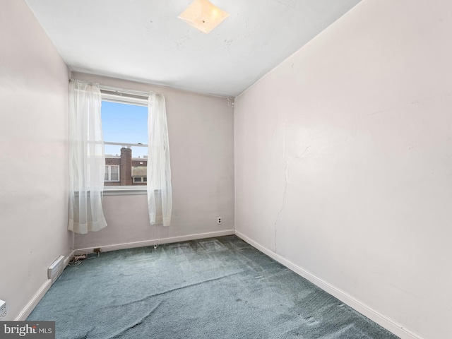 view of carpeted spare room