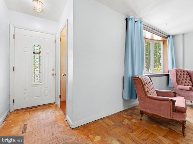 entrance foyer featuring light parquet flooring