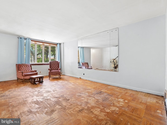 living area with light parquet floors