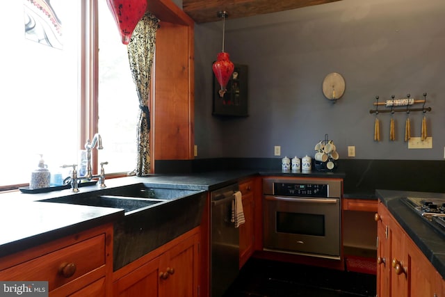 kitchen featuring appliances with stainless steel finishes and sink