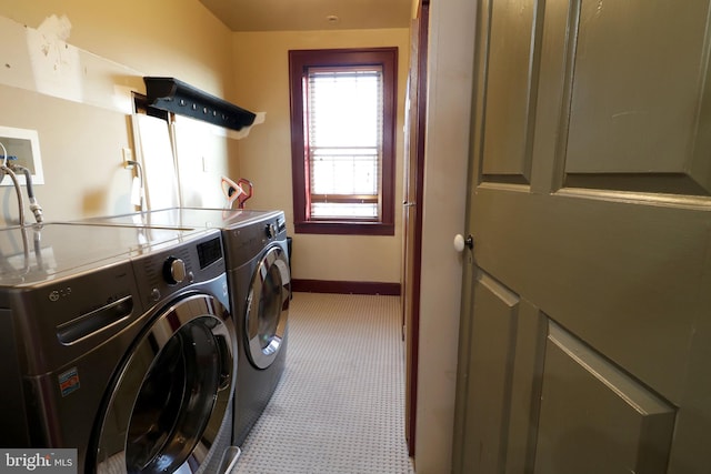 laundry area featuring washer and clothes dryer