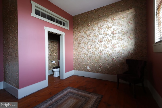 spare room featuring dark hardwood / wood-style flooring