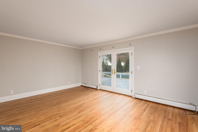 unfurnished room with french doors, crown molding, baseboard heating, and light wood-type flooring