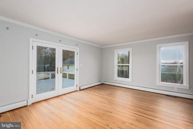 empty room with light hardwood / wood-style floors, baseboard heating, crown molding, and french doors