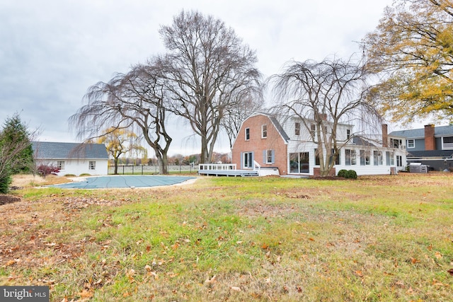 view of yard featuring a covered pool