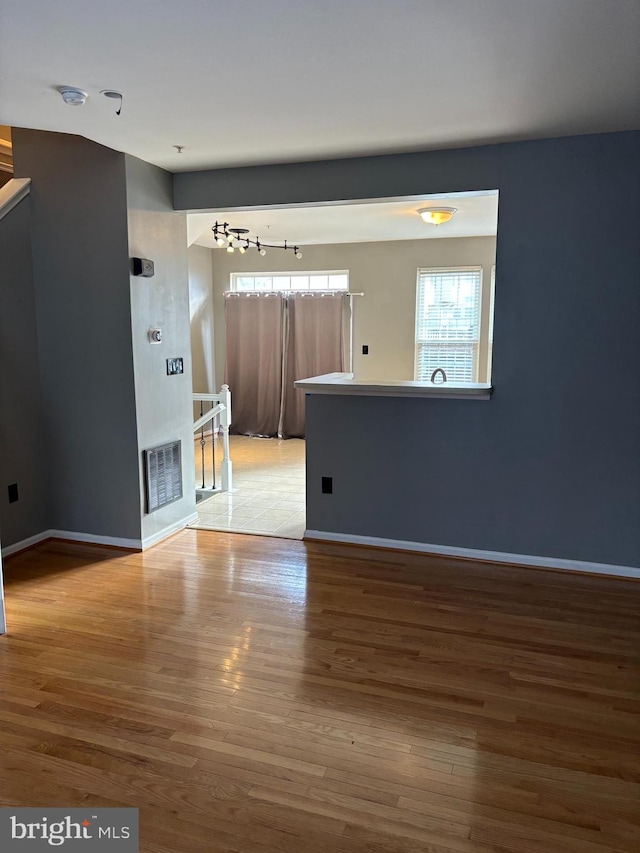 spare room with light wood-type flooring