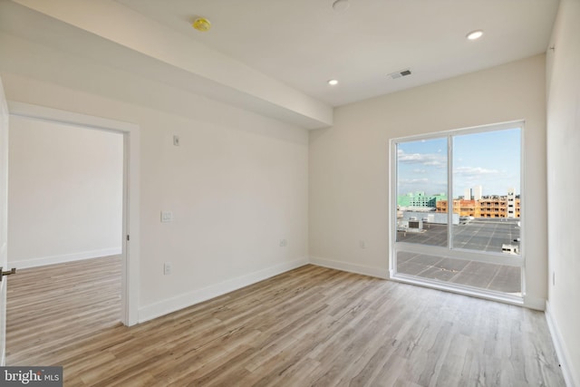 empty room featuring light hardwood / wood-style flooring