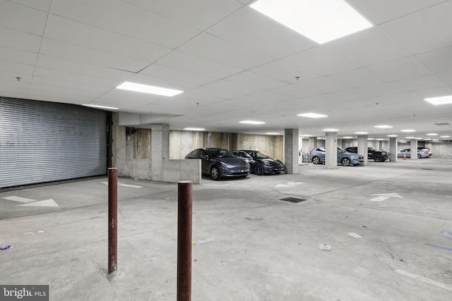 basement with a paneled ceiling