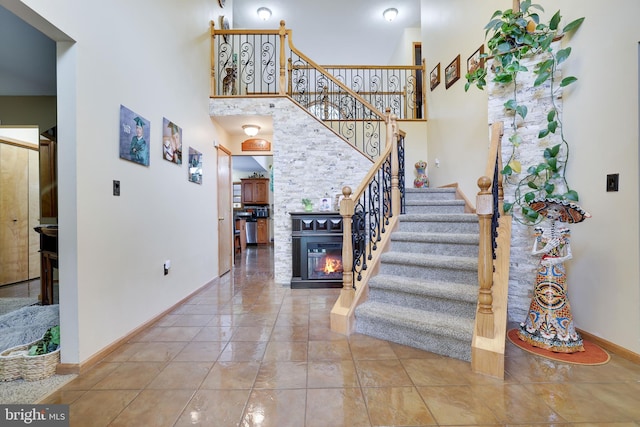 staircase featuring tile patterned floors