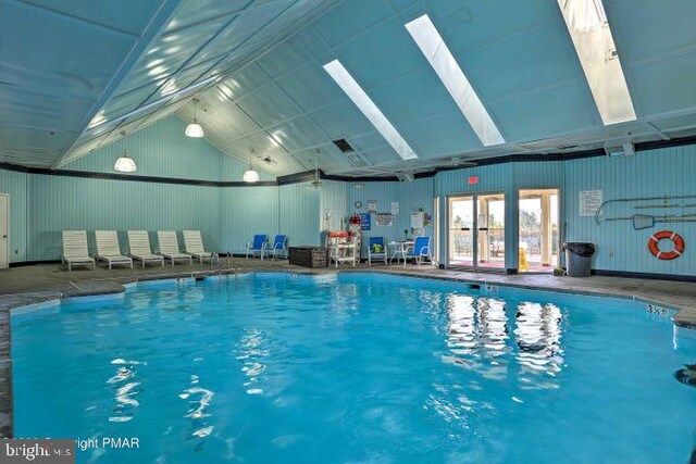 view of pool with a skylight