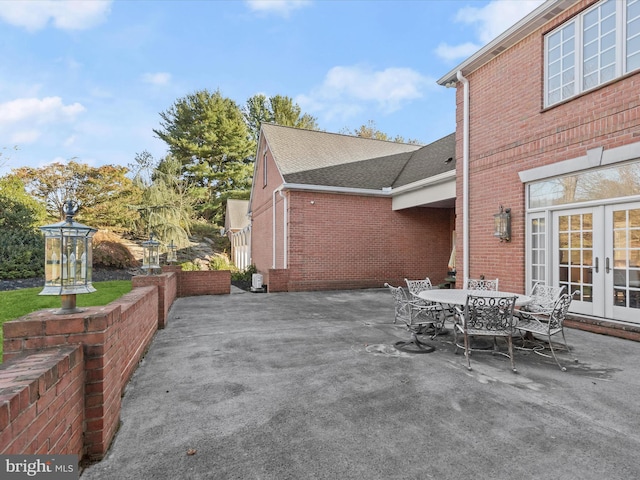 view of patio / terrace with outdoor dining area and french doors