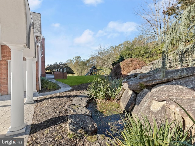 view of yard featuring a playground