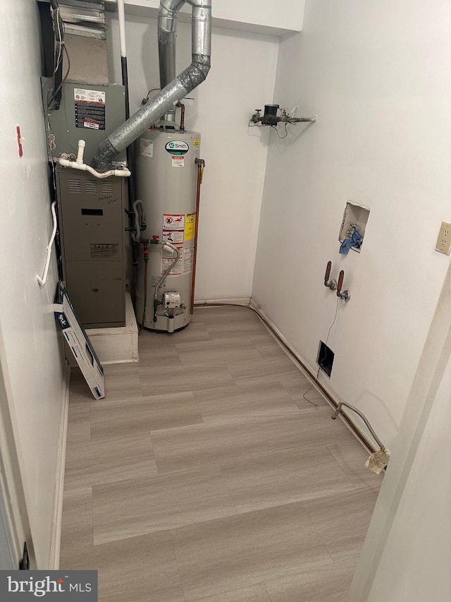 utilities with water heater and heating unit