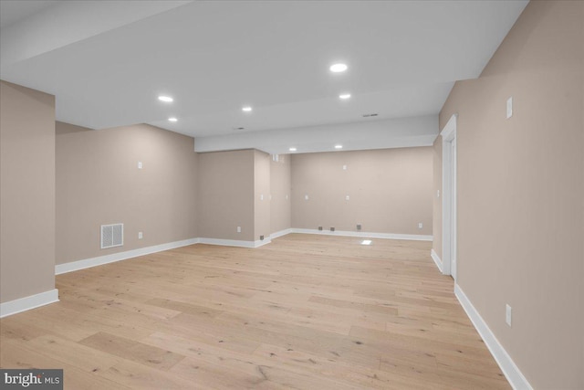 basement with light wood-type flooring