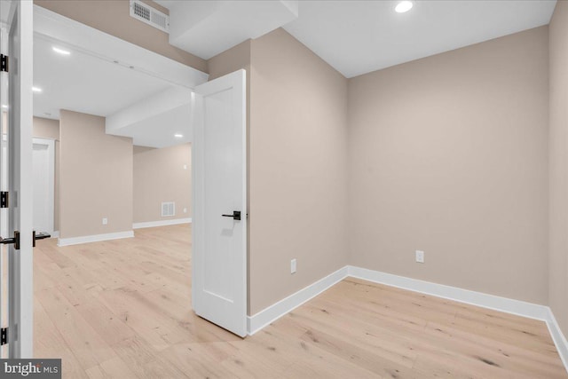 unfurnished room featuring light wood-type flooring